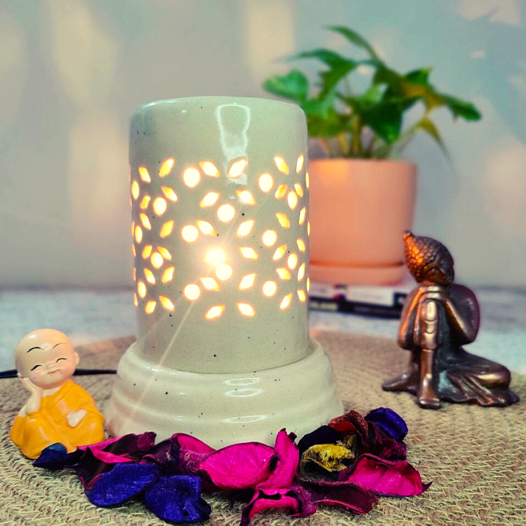 Homefrills Ceramic Cylindrical Shape Electric Aroma Diffuser Oil Burner with 10 ML Lemongrass Aroma Oil for Home/Office & Spa for Aromatherapy/Oil Burners Colour -White (Size-15*12*7 cm)
